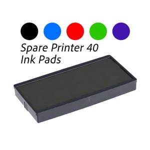 May include: A black ink pad for a printer, with the text "Spare Printer 40 Ink Pads" above it. The image also shows five colored circles: black, blue, red, green, and purple.