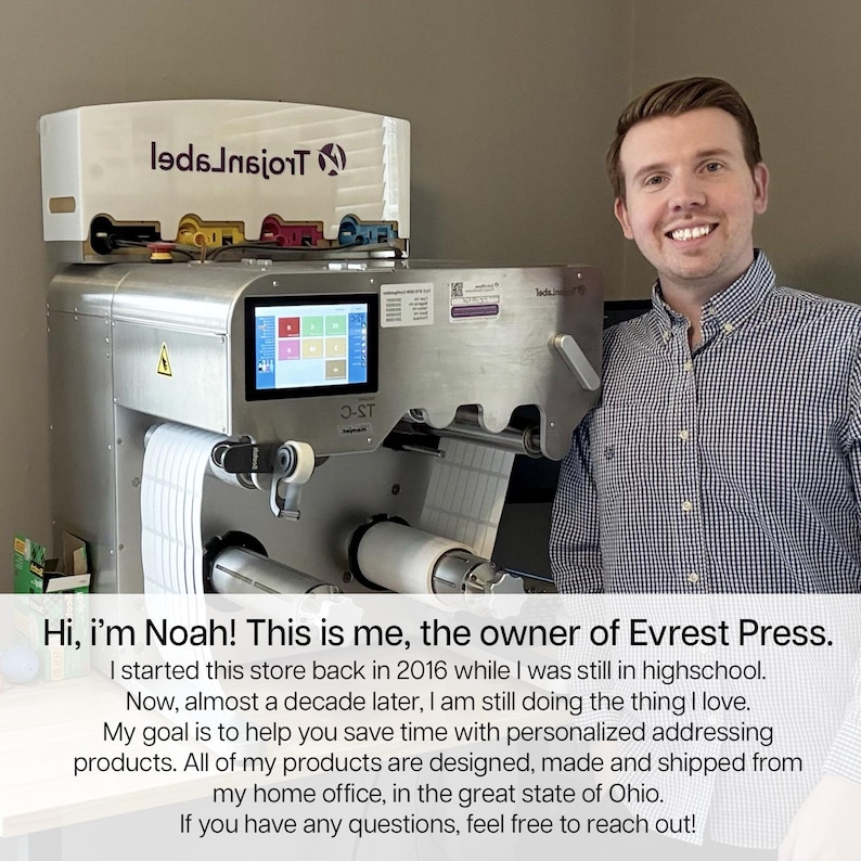 Smiling small business owner standing beside a commercial label printer with rolls of labels. Text overlay introduces him as Noah, founder of Everest Press, highlighting his personalized products and home-based business in Ohio.