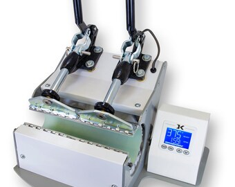 May include: A white and gray mug press with two clamps and a digital control panel. The control panel displays "37.9°C" and "1:59".