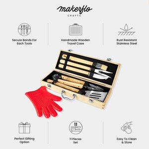 May include: A wooden travel case containing 11 rust-resistant stainless steel barbecue tools with wooden handles. A red silicone oven mitt is included. The case has a handle and secure bands for each tool.