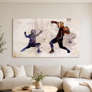 May include: A rectangular wall art print featuring a watercolour illustration of two fencers in a dynamic duel. The fencer on the left is rendered in shades of blue and purple, while the fencer on the right features warm orange and brown tones.
