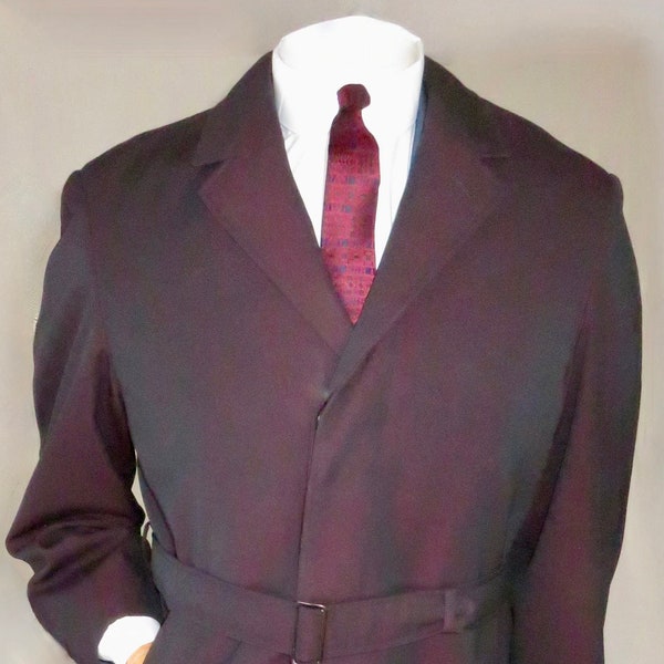 Unworn original early to mid 60's Italian iridescent burgundy to black shorty knee length Mac with full lining / half wool 42"