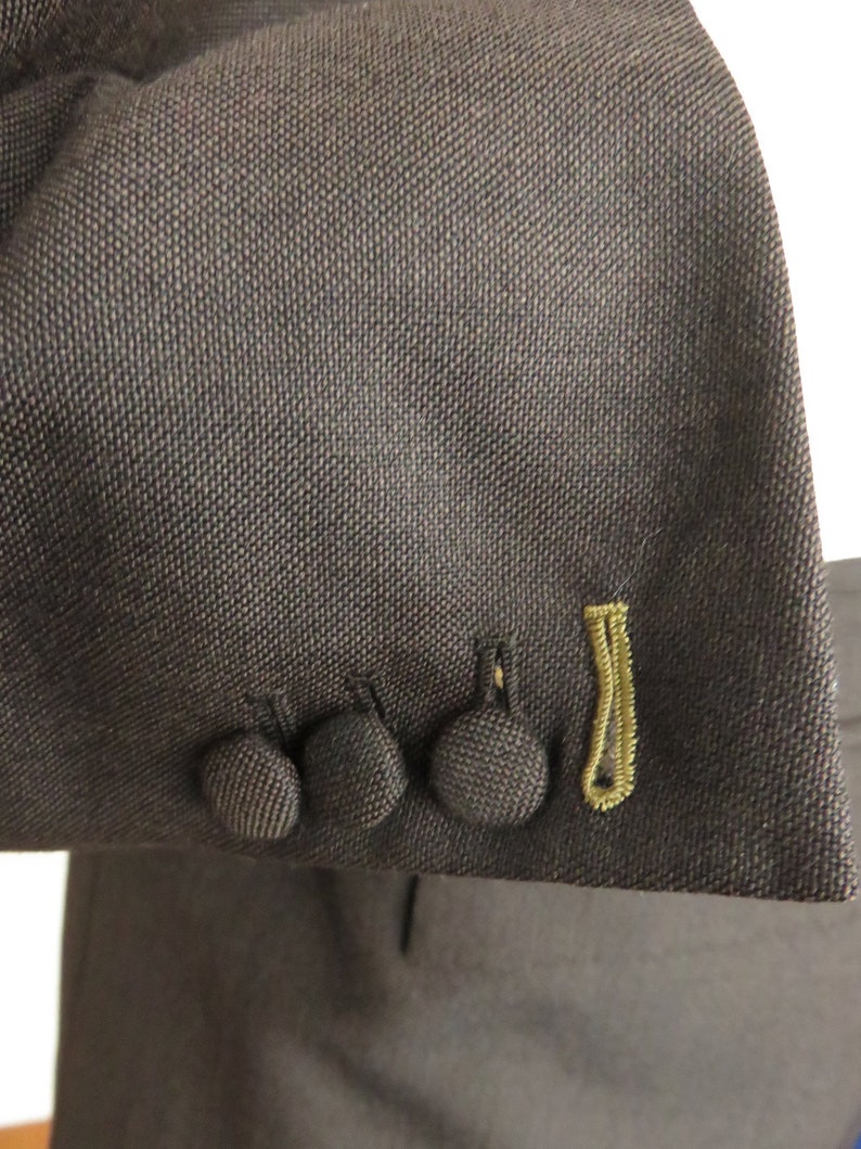 Hardly worn fresh and crisply tailored by a Top London tailor lightweight Mohair Mod Jacket with working mans cuffs size 40