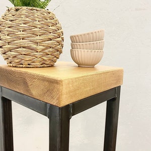 Slim industrial plant stand for small spaces with wood and steel design