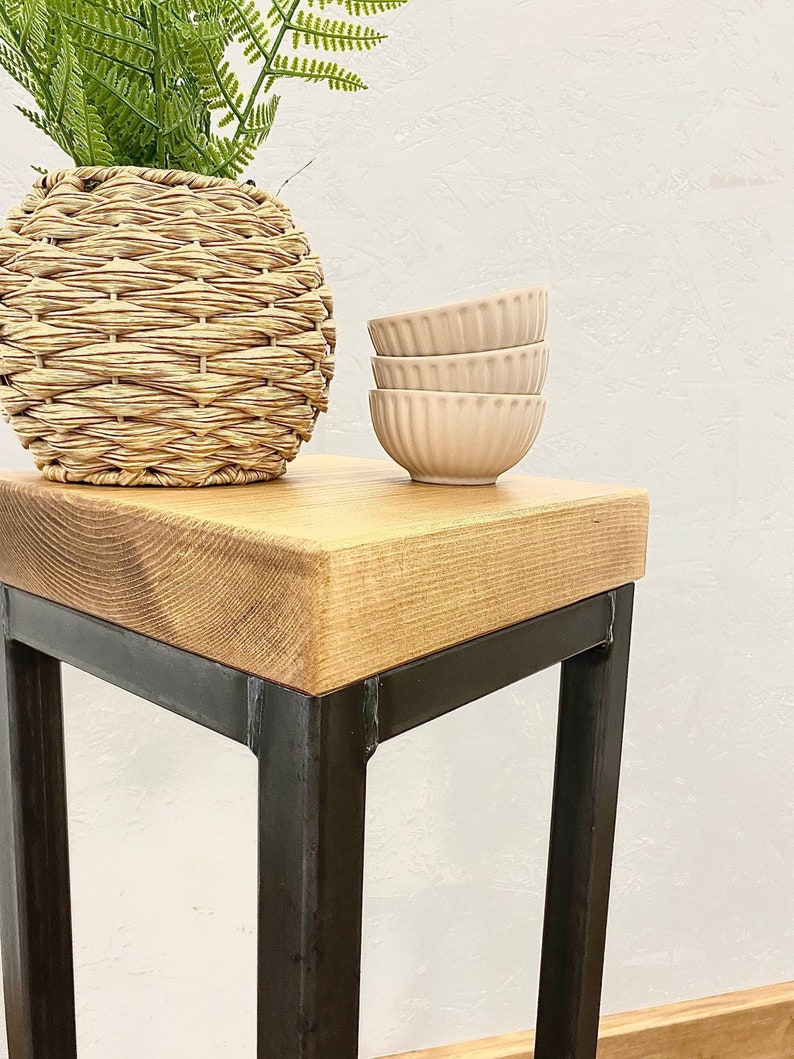 Slim industrial plant stand for small spaces with wood and steel design