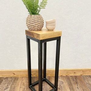 Handcrafted slim plant stand with lacquered steel frame