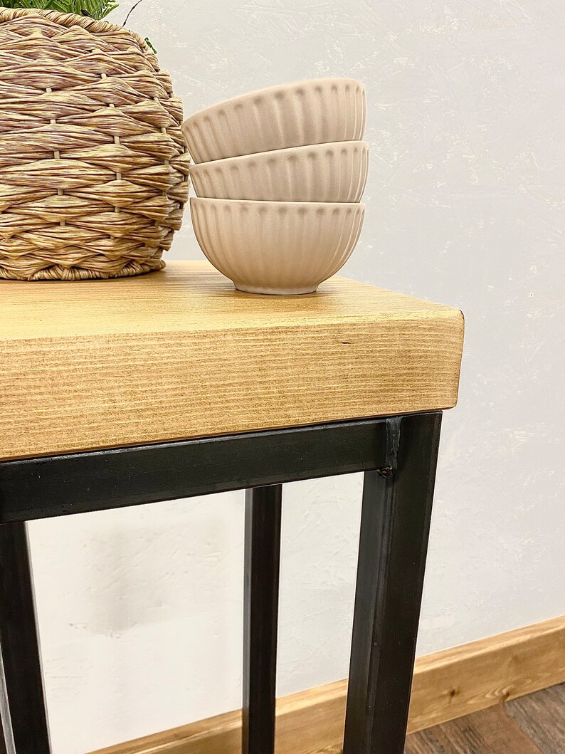 Close up of rustic wood grain on handmade narrow side table