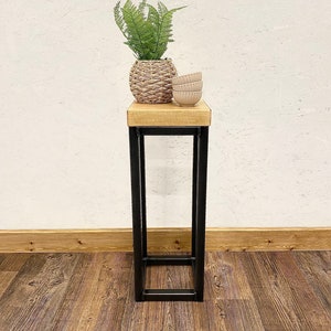 Space-saving industrial furniture piece with rustic wooden top