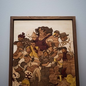 May include: A wooden artwork featuring a group of stylized characters, likely from a video game or comic. The characters are depicted in various poses and outfits, with a range of skin tones and hairstyles. The artwork is framed in a dark wood frame.