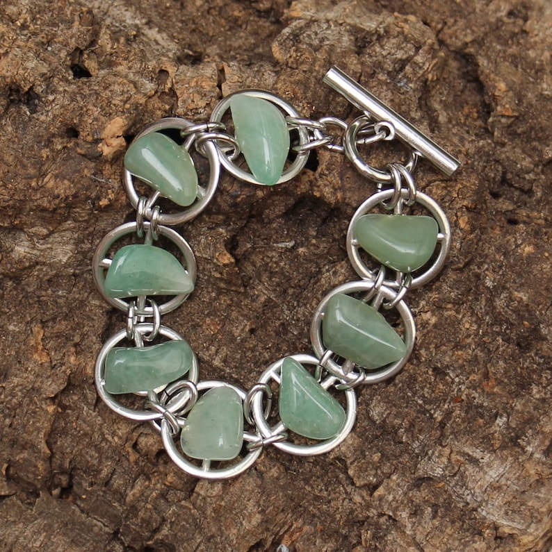 Gear bracelet with Green Gemstones