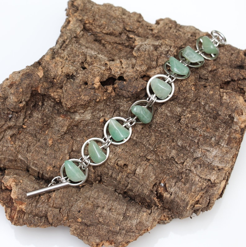 Gear bracelet with Green Gemstones
