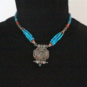 Beautiful Tibetan Gau on turquoise with red coral Necklace