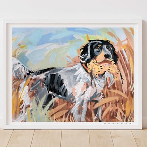 May include: A painting of a black and white dog with brown spots, holding a brown and white object in its mouth. The dog is standing in tall grass with a blue and white background.