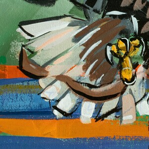 May include: A close-up of a painting with a brown, white, and yellow abstract design. The painting has a textured surface and is painted on a canvas.