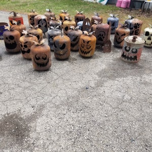 Muddled the Halloween pumpkins, Jack o lanterns, metal lawn art, front porch décor, garden decoration, yard art, gas can. image 8