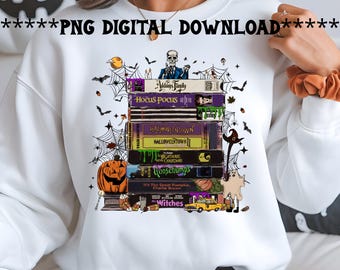 May include: White sweatshirt featuring a stack of Halloween-themed VHS tapes, including "The Addams Family," "Hocus Pocus," and "Goosebumps." The design includes bats, spiderwebs, a jack-o'-lantern, and the text "PNG DIGITAL DOWNLOAD."