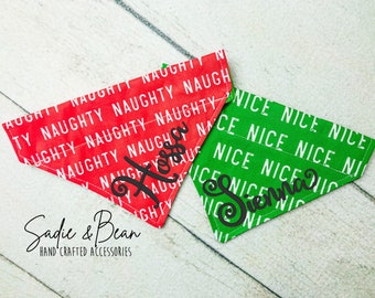 May include: Two red and green dog bandanas with white text that reads "naughty" and "nice". The bandanas are personalized with the names "Hoss" and "Siena" in black.