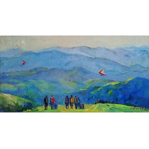 May include: An oil painting shows a mountain landscape with a group of people on a green hillside. Two red and white hang gliders fly in the sky. The mountains are painted in shades of blue and green.
