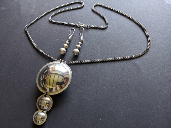 Vintage space age chrome / silver tone space age l