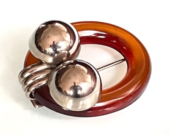 Broche para sombrero o solapa con diseño geométrico Art Deco vintage de baquelita (verificado) y cromo, con diseño clásico de los años 30.