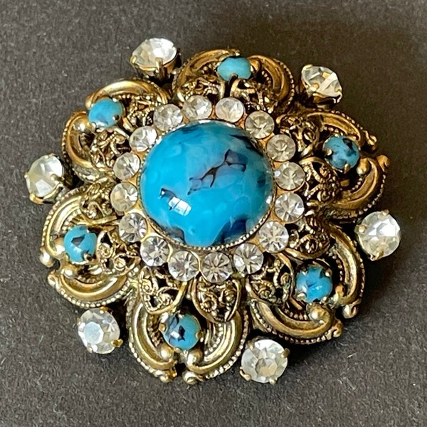 Large vintage Art Deco faux turquoise glass cabochon, clear paste rhinestone and gold tone filigree Czech flower brooch, Max Neiger style