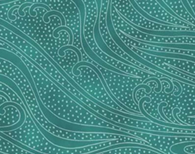 May include: Teal fabric with a white wave pattern and small white dots. The design features stylized waves with curved lines and swirling details, creating a flowing, aquatic aesthetic. The overall effect is a textured, patterned surface.