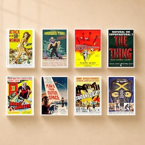 May include: A collection of eight rectangular wall art prints featuring vintage science fiction movie posters including Attack of the 50 Ft. Woman, Forbidden Planet, Invasion of the Body Snatchers, The Thing, Robot Monster, Plan 9 from Outer Space, Tarantula, and X.
