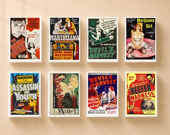 Puede incluir: Un conjunto de ocho láminas rectangulares para pared con pósteres de películas de estilo vintage que incluyen títulos como The Burning Question, Marihuana, Devil's Harvest, Marijuana Girl, Assassin of Youth, The Devil's Weed y Reefer Madness.
