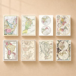 May include: A collection of eight rectangular wall art prints featuring vintage-style cartographic maps. Each print displays detailed geographical regions, including continents, countries, and global hemispheres, rendered in muted tones with fine lines.