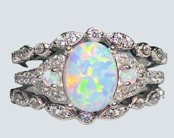 Oval White Fire Opal Engagement Ring Set: Sterling Silver CZ Halo
