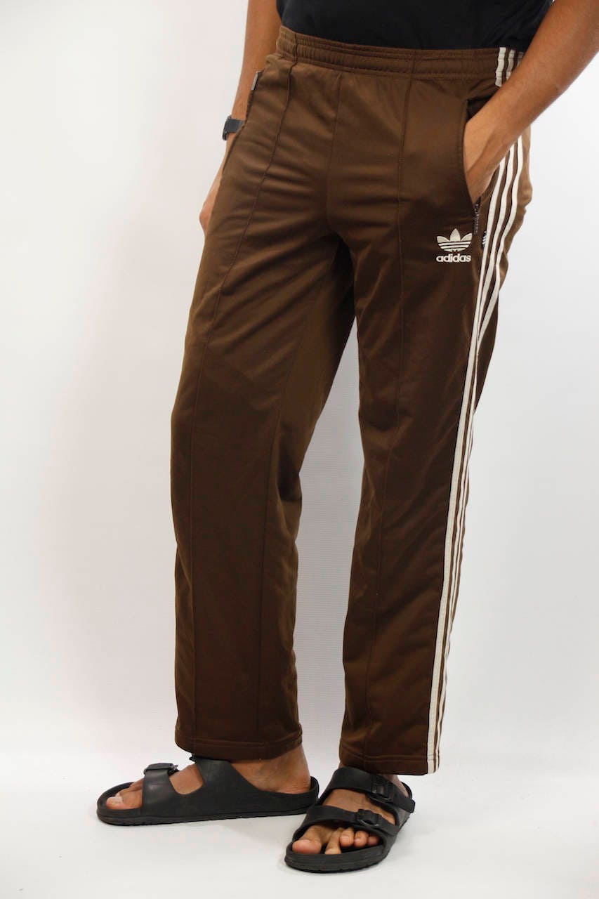 brown adidas track pants