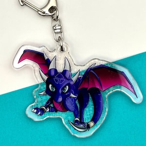 Cynder the Dragon Double-Sided Acrylic Charm Keychain: A Dazzling and Durable Rival