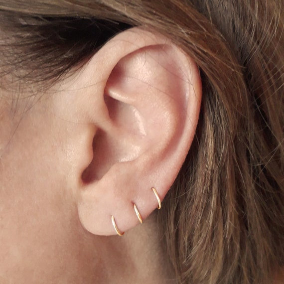 Set of three gold hoop best sale earrings