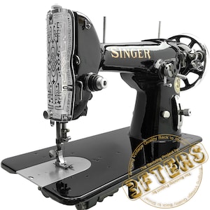 May include: A vintage black Singer sewing machine with gold lettering. The machine features ornate silver detailing on the front panel and a silver needle plate. The base is black, and the machine has a hand wheel and various levers.