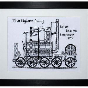 May include: Black and white cross-stitch embroidery of a steam locomotive called "The Wylam Dilly". The locomotive is labelled "Wylam Colliery Locomotive 1815".