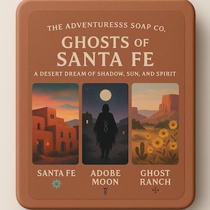 May include: A brown soap box with the text "THE ADVENTURESSS SOAP CO. GHOSTS OF SANTA FE". The box features three illustrations: Santa Fe buildings, a figure under a moon, and desert flowers. The text "A DESERT DREAM OF SHADOW, SUN, AND SPIRIT" is also included.