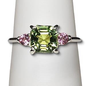 A sterling silver tribute to the Classic Three Stone Ring! Mint Green Tourmaline, Ascher Cut, 1.93ct, Pink Tourmaline. October Birthstone