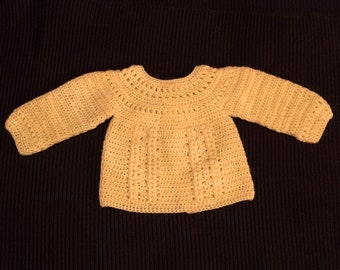 Yellow baby jacket pattern made by crochet