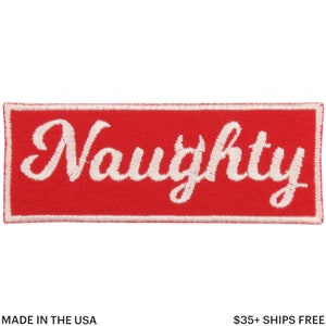 May include: A rectangular red embroidered patch with the word "Naughty" in white script. The patch has a white border and is made in the USA.