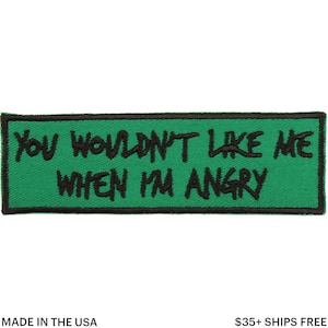 May include: A green rectangular patch with black embroidered text. The text reads "YOU WOULDN'T LIKE ME WHEN I'M ANGRY." The patch has a black border and the words "MADE IN THE USA" are at the bottom.