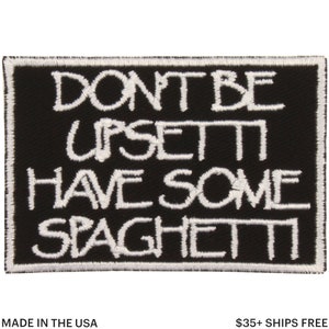 May include: Black rectangular patch with white embroidered text that reads "DON'T BE UPSETTI HAVE SOME SPAGHETTI." The patch has a white border and the text is in a handwritten style. The words "MADE IN THE USA" are at the bottom.