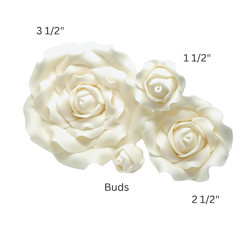 May include: Ivory-colored rose blossoms and buds in various sizes. The largest flower measures 3 1/2 inches, with others at 2 1/2 and 1 1/2 inches. The smallest is labeled "Buds". These decorative flowers are ideal for crafts.