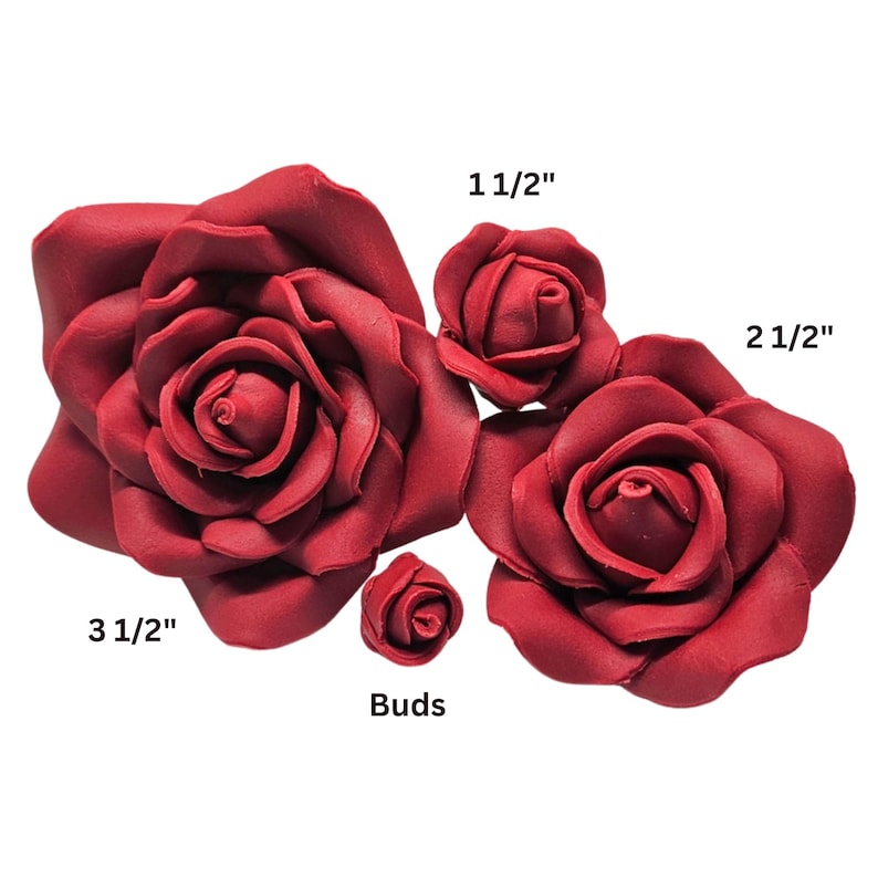 May include: A collection of burgundy-colored artificial roses in various sizes. The largest rose measures 3 1/2 inches, with others at 2 1/2 inches and 1 1/2 inches. A small bud is also included. These decorative flowers are ideal for crafts.