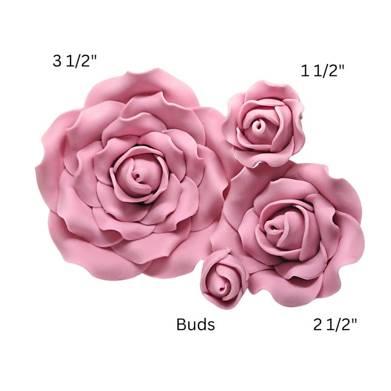 May include: Pink artificial rose flowers in various sizes, including a large 3 1/2 inch bloom and smaller buds. The image shows several flowers and buds, perfect for crafting or decoration.