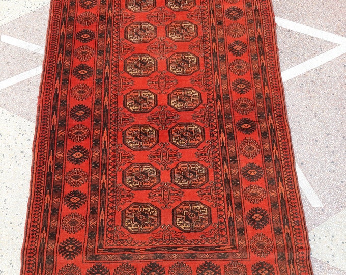 Vintage Hand knotted Bokhara afghan rug