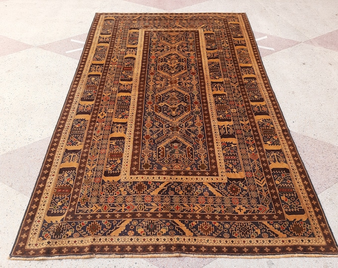 Traditional handmade tribal vintage baluchi rug