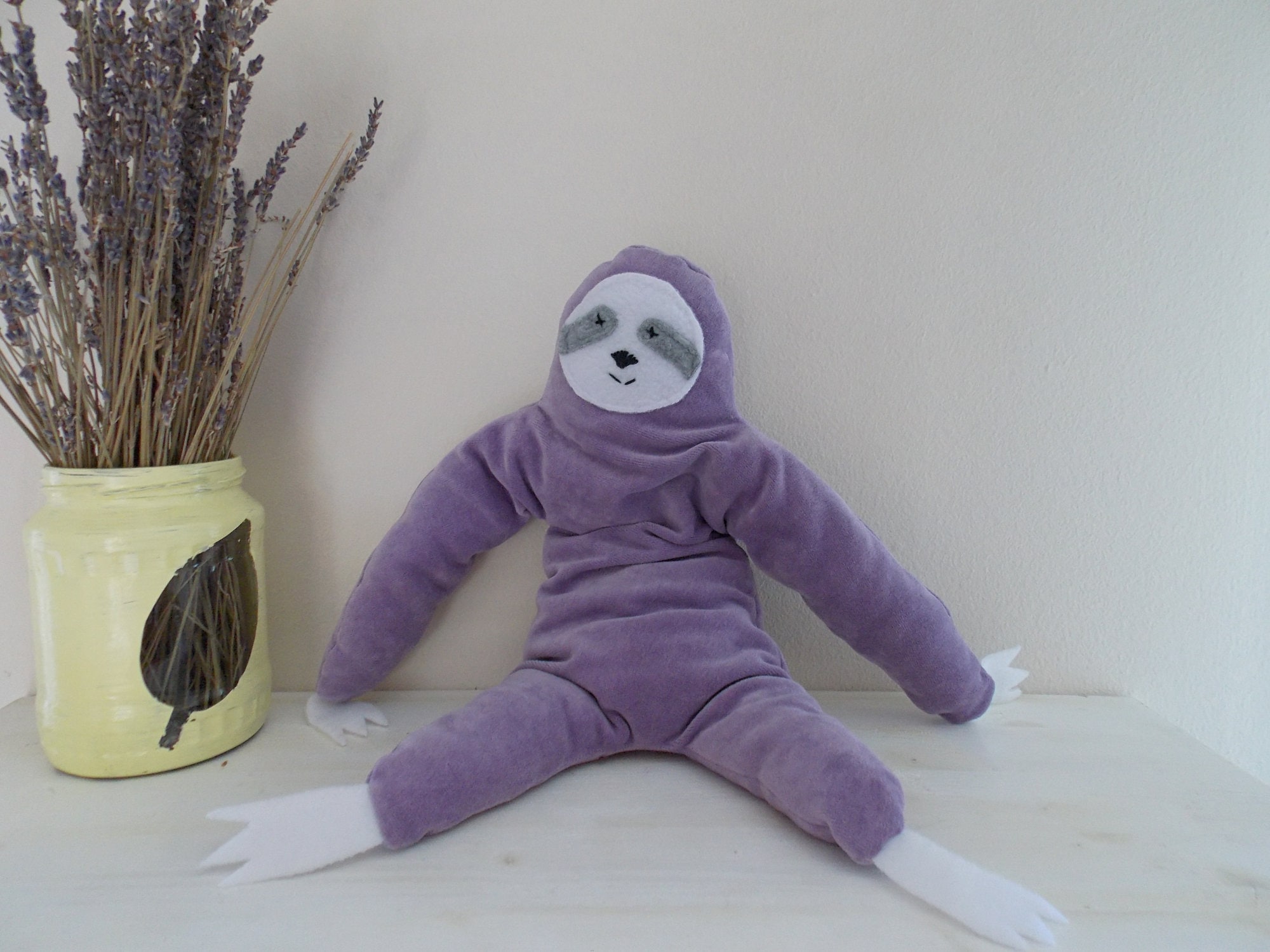 Purple on sale sloth plush