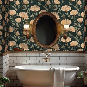 May include: A bathroom with a white bathtub, a gold-framed oval mirror, and sconces. The walls are covered in a dark green floral wallpaper with beige flowers. The room has a classic, vintage aesthetic.
