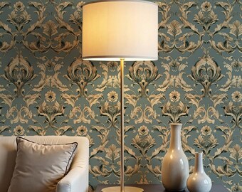 May include: A floor lamp with a beige lampshade and a gold-colored base and pole stands next to a sofa and a table with two vases. The background is a teal wallpaper with a gold and brown floral pattern.