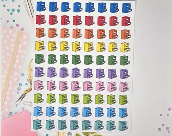 May include: A sheet of colorful file cabinet stickers with the text "Organizing Chaos". The stickers are in a rainbow pattern of blue, red, orange, yellow, green, purple, and pink.